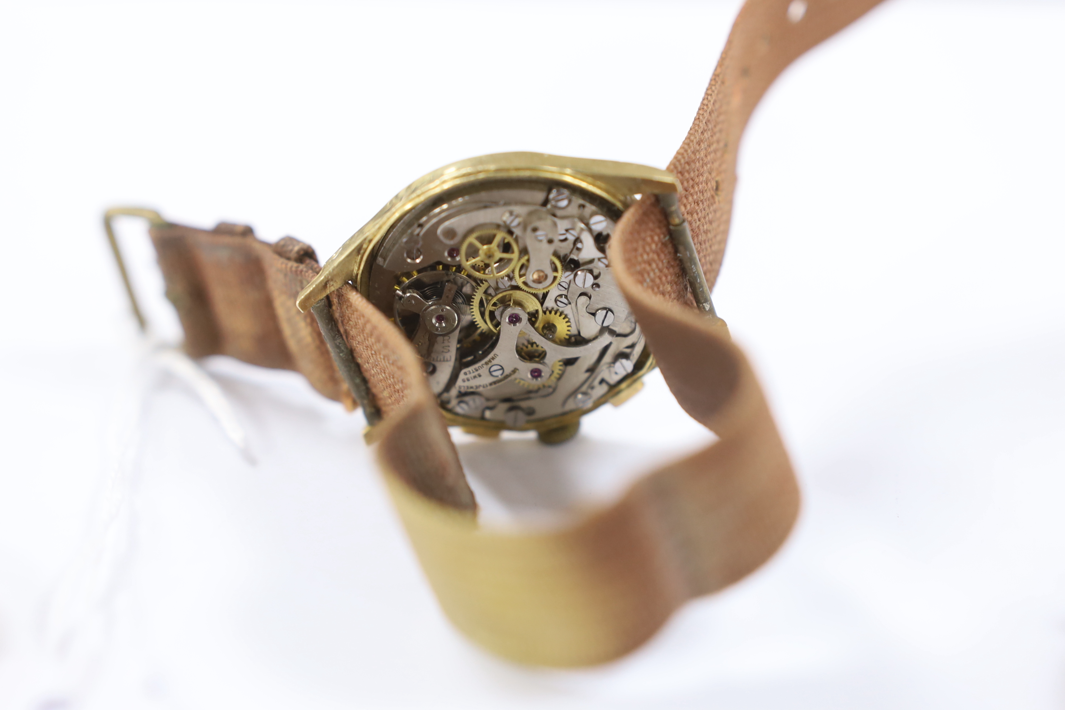 A gentleman's 18k Orator manual wind wrist watch (a.f.) and an 18k fob watch.